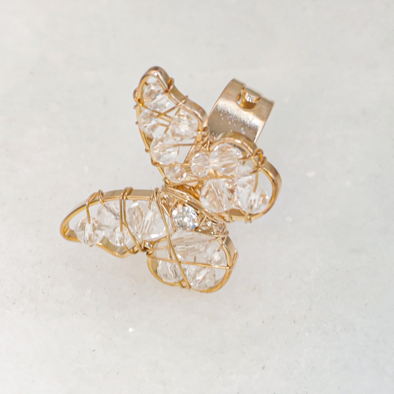 Anel borboleta com cristais transparente e strass folheado em ouro 18k 302160000000010