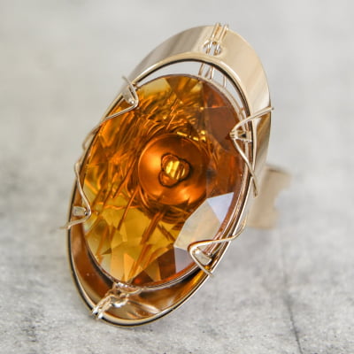 Anel com resina marrom folheado em ouro 18k 302130000000014